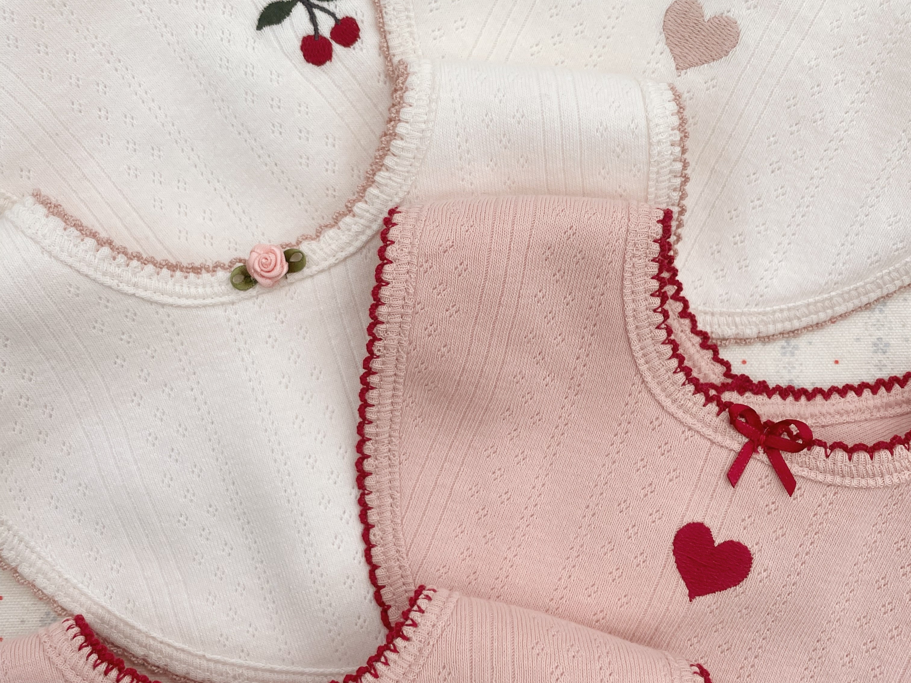 Konges Sløjd A/S Kwijlslabbetjes rose/white mix